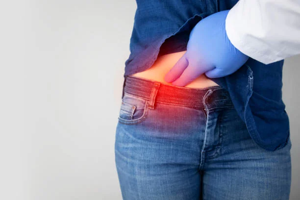 Image of Doctor checking a person's lower stomach